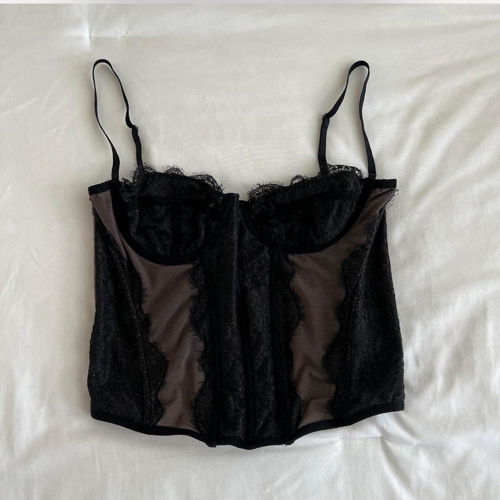 Urban Outfitters Corset 
Black lace corset w/ mesh details 
Adjustable straps